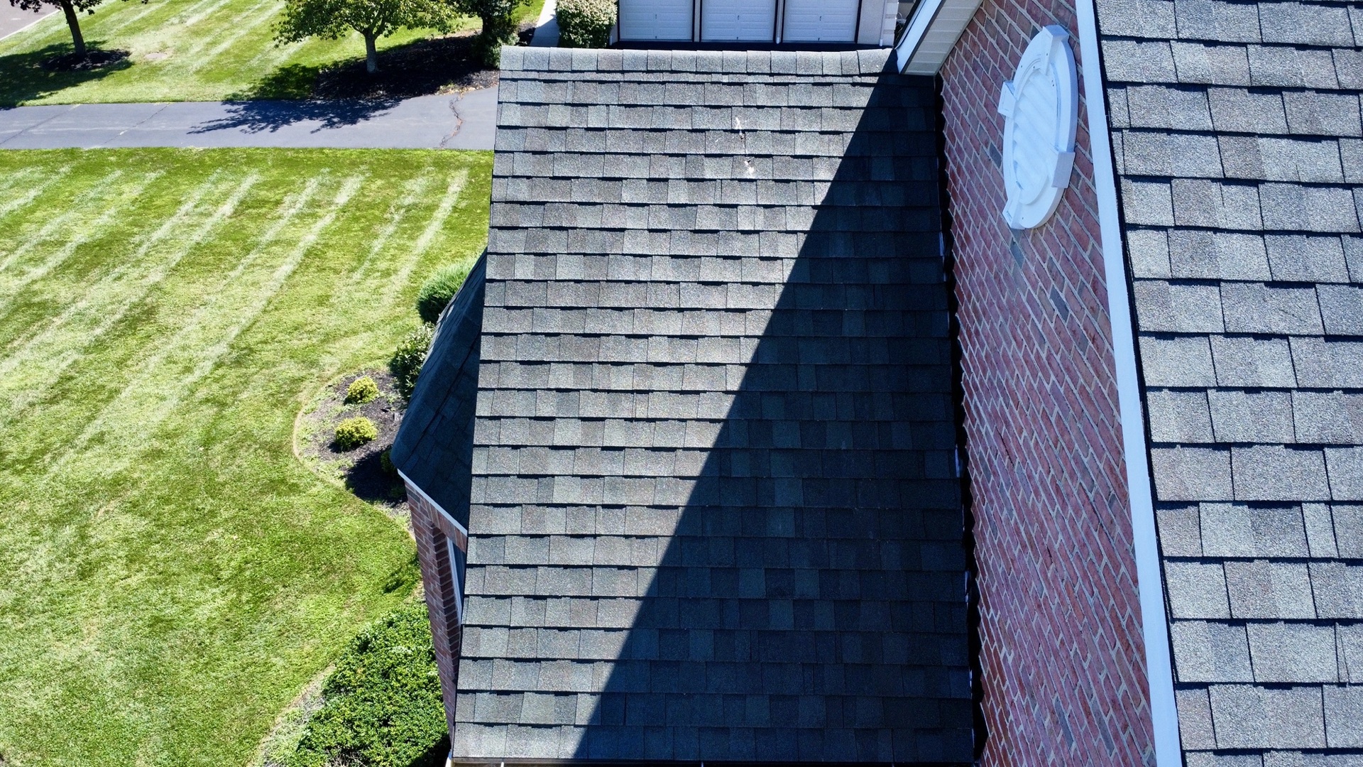 Before roof washing — algae staining